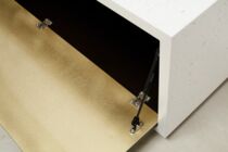 Beton-Lowboard mit Klappe aus Messing