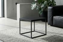 Beistelltisch aus Beton in einem Wohnzimmer